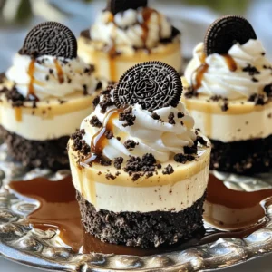 - 1 package (14-16 Oreo cookies, crushed) - 4 tablespoons unsalted butter, melted - 16 ounces cream cheese, softened - 1 cup powdered sugar - 1 teaspoon vanilla extract - 2 cups heavy whipping cream - 12 Oreo cookies, finely crushed for topping - Chocolate syrup (optional for drizzling) - Mixing bowls - Hand mixer - Measuring cups and spoons - Individual cups or jars Gather these ingredients before you start. Each item plays a vital role in creating your Oreo no-bake cheesecake cups. The crushed Oreos provide a rich, chocolatey crust. The cream cheese gives the filling that creamy texture we love. You will need to melt the butter. This helps the cookie crumbs stick together. Make sure the cream cheese is softened. It blends easier and makes the filling smooth. The heavy cream is key for that light, fluffy texture. For the best results, use a hand mixer. It makes it easy to beat the cream cheese and whip the cream. Individual cups or jars are great for serving. They make each dessert look lovely and ready to enjoy. If you want to add a twist, consider the optional chocolate syrup. It makes a great drizzle and adds extra sweetness. Trust me, these little details can elevate your dessert. For the full recipe, check out the complete guide. Enjoy the fun of making this easy dessert delight! To start, gather your crushed Oreo cookies and melted butter. In a medium bowl, combine them well. You want the crumbs fully coated in butter. Next, divide this mixture into individual cups or jars. Press the crumbs down gently to create a solid base. This crust sets the stage for your cheesecake filling. Now, let’s make the filling. In a large mixing bowl, beat the softened cream cheese with a hand mixer. Your goal is to have it smooth and creamy. Slowly add the powdered sugar and vanilla extract. Keep mixing until everything is well blended. This step is key for a sweet, rich flavor. Once your crust is ready, remove the cups from the fridge. Spoon the cheesecake filling over the crust, filling each cup nearly to the top. This creates a lovely layer of creamy goodness. Finish off by sprinkling finely crushed Oreo cookies on top. This adds texture and extra Oreo flavor. Now, it’s time to chill. Cover the cups and place them in the fridge for at least 4 hours. This helps the filling set perfectly. For a fun twist, consider drizzling chocolate syrup just before you serve. It adds a delicious touch that everyone will love. Enjoy the tasty treat! For the full recipe, check out the [Full Recipe]. To get the best cheesecake, you must start with softened cream cheese. If it's too cold, it will not mix well. You want a smooth and creamy mixture. When you whip the heavy cream, make sure to get stiff peaks. Then, gently fold the whipped cream into the cream cheese mixture. This keeps it light and fluffy. A beautiful dessert is a joy to see. Use garnishes like a dollop of whipped cream and a half Oreo on top of each cup. This adds a nice touch. For serving, place the cups on a decorative platter. This makes your dessert stand out even more. If you find the cheesecake too sweet, you can adjust it. Simply lower the amount of powdered sugar. Taste as you go. You can also use less sweet toppings, like fresh fruit or dark chocolate. This way, you can create a balance that suits your taste. {{image_2}} You can change the flavor of your cheesecake cups easily. Try adding a tablespoon of cocoa powder for a richer taste. This small addition can give you a chocolate twist that is hard to resist! You can also experiment with flavored extracts. Almond extract can bring a nice nutty flavor to your cups. Just a little can make a big difference. Toppings can change the whole look and taste of your dessert. Instead of just using more Oreos, you can use crushed candies or fresh fruit. Think about strawberries or raspberries for a fruity touch. Drizzling caramel or berry sauce on top can add a sweet, sticky element. This gives your cheesecake cups a fun and unique style. If you need gluten-free options, it’s easy to adapt this recipe. Simply substitute regular Oreos with gluten-free versions. These cookies taste just as good and keep the right texture. For drizzling, you can use gluten-free melted chocolate. This way, everyone can enjoy these tasty treats without worry. For the full recipe, check the detailed instructions above. Keep your Oreo no-bake cheesecake cups covered in the refrigerator. They stay fresh for up to 3 days. Use an airtight container to keep them safe from other smells. This way, you enjoy every last bite of that creamy goodness. Can the cheesecake cups be frozen? Yes, you can! They freeze well for up to 2 months. To enjoy them later, just thaw in the fridge before serving. This keeps the texture smooth and creamy, just like when you made them fresh. Yes, but it may alter the texture slightly. Low-fat cream cheese can make the filling less rich. If you want a lighter dessert, this is a good choice. They are best consumed within 3 days if stored properly. Keep them in the fridge, covered well. This helps maintain their fresh taste and creamy texture. Yes, substitute dairy ingredients with non-dairy equivalents. Use vegan cream cheese and non-dairy whipped cream. This way, you can enjoy these delicious cups without dairy! This blog post shared a simple recipe for delicious Oreo cheesecake cups. We covered the ingredients, equipment, and easy step-by-step instructions. You learned tips for perfecting texture, presentation ideas, and ways to reduce sweetness. I introduced tasty variations, including alternative toppings and gluten-free options. Finally, we discussed storage tips to keep your treats fresh. Enjoy making these cups for your next gathering. They are sure to impress!