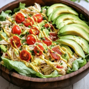 - 2 cups cooked chicken breast, shredded - 4 slices of crispy bacon, crumbled - 2 cups cherry tomatoes, halved - 1 cup romaine lettuce, chopped - 1 cup mayonnaise - 1 tablespoon Dijon mustard - 1 teaspoon garlic powder - Salt and pepper to taste - 1 tablespoon fresh chives, chopped (for garnish) - Optional: 1 avocado, diced To create a tasty BLT Chicken Salad, you need fresh and simple ingredients. Let's talk about the main components. You start with cooked chicken breast. I prefer to use shredded chicken. It mixes well and absorbs flavor effectively. You can use leftover rotisserie chicken too. It saves time and adds great taste. Next, crispy bacon adds a salty crunch. Cook it until it’s nice and crisp. Then crumble it into small pieces. This gives each bite a delightful texture. Cherry tomatoes bring a sweet pop. Halve them to make them easy to mix in. Their freshness brightens the salad. Finally, we have romaine lettuce. Chop it into bite-sized pieces. It adds a crispy base and makes the salad feel light. Now, let’s move on to the dressing. A creamy dressing makes the salad rich and satisfying. For the dressing, you need mayonnaise as the base. It gives a smooth texture. Add Dijon mustard for a bit of tang. It really enhances the taste. Mix in garlic powder for some depth. It adds a nice flavor without being overpowering. Lastly, season with salt and pepper. Taste as you go to find the right balance. You can also include some fresh chives for garnish. They add a nice color and mild onion flavor. If you love avocados, you can dice one and mix it in. This adds creaminess and healthy fats. This recipe is simple but lets you enjoy great flavors. Check out the Full Recipe for more details on making this delicious dish! - In a large bowl, combine shredded chicken, crumbled bacon, and halved cherry tomatoes. - In another bowl, mix mayonnaise, Dijon mustard, garlic powder, salt, and pepper to create the dressing. This step is simple. Just add the chicken, bacon, and tomatoes to one bowl. You want to get the right balance of flavors. Then, whip up the dressing. Each ingredient plays a role. Mayonnaise brings creaminess, and Dijon adds a nice kick. Garlic powder gives a deep flavor. The salt and pepper enhance everything. - Pour the dressing over the chicken mixture and mix until coated. - Add chopped romaine lettuce and diced avocado, tossing lightly. Once the dressing is ready, pour it over the chicken mix. Stir gently until everything is coated. This ensures each bite is tasty. Next, add the romaine lettuce and avocado if using. Toss lightly to keep the lettuce crisp. This mix of textures makes the salad fun to eat. - Cover and refrigerate for at least 30 minutes. - Serve chilled, garnished with fresh chives. Chilling the salad is key. It allows the flavors to meld together. Cover the bowl and put it in the fridge for at least 30 minutes. When ready to serve, scoop it into bowls and top with fresh chives. They add a nice pop of color and flavor. For the full recipe, check below. To shred cooked chicken easily, use two forks. Hold one fork steady and pull the chicken apart with the other. This method works fast and gives you nice, even shreds. For the best flavor, use chicken breast. It cooks well and stays juicy when you shred it. You can also grill or roast it for added taste. To cook bacon crispy, use a skillet over medium heat. Lay the strips flat and cook until they turn golden brown. Turn them a few times for even cooking. Once done, let the bacon cool on paper towels. This helps soak up extra grease. For crumbling, use your hands or a knife. This way, you get nice, crunchy bits for your salad. To adjust flavors, taste as you go. Start with a pinch of salt and pepper. You can add more later if needed. For unique tastes, try adding smoked paprika or a dash of hot sauce. These small changes can bring new life to your salad. You can also swap mayonnaise for Greek yogurt for a tangy twist. Use these tips to make your BLT Chicken Salad fresh and flavorful. Don’t forget to check the Full Recipe for all details! {{image_2}} You can make this salad your own by adding more veggies. Bell peppers add a nice crunch. Try diced cucumbers for extra freshness. These veggies mix well with the chicken and bacon. You can also add cheese for a creamy touch. Feta or cheddar works great. Nuts like pecans or walnuts can give the salad a delightful crunch too. If you need gluten-free options, look for gluten-free mayonnaise. Many brands now offer this. You can also use yogurt as a base for a lighter dressing. For low-calorie swaps, try using Greek yogurt instead of mayonnaise. This keeps the creaminess but cuts down on calories. You can serve this salad as a sandwich or wrap. Just put it between slices of bread or in a tortilla. It’s also great as a light appetizer. Present it on a bed of greens for a nice touch. This makes it look fancy and fresh. For the full recipe, check out the complete guide on making this flavorful dish. To store leftover BLT Chicken Salad, place it in an airtight container. It helps keep the salad fresh. You can enjoy it for about three days. Just remember to check for any changes in smell or texture before eating. If you want to freeze the chicken salad, divide it into small portions. Use freezer-safe containers or bags. When you're ready to eat, thaw it in the fridge overnight. Freezing can change the texture a bit, making it less crunchy. The taste will still be good, but fresh is best. I don’t recommend reheating BLT Chicken Salad. It tastes best cold. If you must warm it up, do so gently in the microwave. Heat it for short intervals. Avoid cooking it too long, or you will lose the freshness. Enjoy it cold for the best flavor! For the full recipe, check out the section above. I recommend using cooked chicken breast for this salad. It stays moist and has great flavor. You can also use rotisserie chicken for a quick option. Just shred the meat and mix it in. Dark meat like chicken thighs works well too. It adds richness to the dish. Ensure the chicken is cooked fully for safety and taste. Yes, you can make this salad ahead of time! It’s best to prepare it a few hours before serving. This gives the flavors time to blend. If you need to, you can also prepare it a day in advance. Just store it in the fridge. Keep the lettuce separate until you are ready to serve. This keeps it crisp and fresh. To make this salad dairy-free, use a dairy-free mayonnaise. There are many tasty options available. Look for brands that use avocado or olive oil as bases. You can skip cheese if you want. If you love the creaminess, add diced avocado instead. It adds smooth texture without dairy. Enjoy your delicious dairy-free BLT Chicken Salad! The BLT Chicken Salad combines tender chicken, crispy bacon, and fresh tomatoes. This simple dish is topped with a creamy dressing that you can customize. You can easily adapt it to your taste and dietary needs. Remember to chill it for the best flavor! Whether you serve it as a light meal or a tasty appetizer, this salad shines. Enjoy trying different ingredients to make it your own. With these tips, you’ll impress everyone at your next gathering.