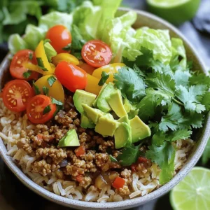 - 1 pound lean ground turkey - 1 tablespoon olive oil - 1 medium onion, diced - 2 cloves garlic, minced - 1 bell pepper (any color), chopped - 1 can (15 oz) black beans, drained and rinsed - 1 cup corn (frozen or canned) - 1 tablespoon taco seasoning - Salt and pepper to taste - 2 cups cooked brown rice or quinoa - 1 cup cherry tomatoes, halved - 1 avocado, diced - 1 cup shredded lettuce - Fresh cilantro, for garnish - Lime wedges, for serving The ingredients in this healthy turkey taco bowl create a feast for your taste buds. You start with lean ground turkey for protein. It keeps the meal light while still being filling. Olive oil adds healthy fat and flavor. You can use any color bell pepper. The onion and garlic bring depth and aroma to the dish. Next, the black beans and corn add fiber and sweetness. The taco seasoning ties everything together with a burst of flavor. You can adjust the salt and pepper to your liking. For a base, I love using brown rice or quinoa. They provide a hearty feel and are good for you. Toppings are where you can get creative! Cherry tomatoes and avocado add freshness. Shredded lettuce gives a nice crunch. Don't forget the cilantro; it brightens the bowl. Lime wedges are perfect for squeezing over the top. This combination makes every bite a delight. If you want to see the complete recipe, check out the Full Recipe section. It will guide you step-by-step in making this dish. Enjoy creating your own healthy turkey taco bowl! - Cook the Turkey: In a large skillet, heat 1 tablespoon of olive oil over medium heat. Add 1 medium diced onion. Sauté for about 3 minutes until it is translucent. - Add Garlic and Peppers: Stir in 2 cloves of minced garlic and 1 chopped bell pepper. Cook for another 2-3 minutes until the peppers are soft. - Brown the Turkey: Add 1 pound of lean ground turkey to the skillet. Cook, breaking it apart with a spatula, until it is no longer pink. This should take about 5-7 minutes. - Season: Mix in 1 tablespoon of taco seasoning, 1 can of drained and rinsed black beans, and 1 cup of corn. Cook for another 5 minutes until everything is hot. Season with salt and pepper to taste. - Layering: In a bowl, place 2 cups of cooked brown rice or quinoa at the bottom. - Topping & Serving: Add the turkey mixture on top of the rice. Then, layer with halved cherry tomatoes, diced avocado, and shredded lettuce. Finally, garnish with fresh cilantro and serve with lime wedges. For full details on the ingredients, check the Full Recipe. - Using Lean Ground Turkey: Opt for 99% lean turkey for a healthier option. This helps cut down on fat while keeping protein high. - Perfecting Taco Seasoning: Adjust the spice level according to your taste. You can add more or less seasoning based on your heat tolerance. - Layering Ingredients: Layer your ingredients to make each layer visible. This adds color and makes the dish inviting. - Garnishing: Use vibrant garnishes like lime wedges and fresh cilantro. These add nice color and flavor to the bowl. - Recommended Tools: Use a large skillet for cooking the turkey and mixing bowls for assembling your bowl. This keeps things organized and easy to manage. - Cooking Time: Keep an eye on the stove. This helps prevent overcooking and burning your ingredients, which can ruin the dish. Remember, these tips can elevate your Healthy Turkey Taco Bowl experience! For the full recipe, check out the detailed steps earlier in this article. {{image_2}} - Protein Options: You can swap ground turkey for ground chicken or beef. Each option brings a unique flavor. - Grain Alternatives: For a low-carb meal, use cauliflower rice instead of brown rice or quinoa. It adds a nice texture and keeps it light. - Spice it Up: If you like heat, add fresh jalapeños or a dash of hot sauce. These additions can take the dish to the next level. - Fresh Herbs: Try using fresh parsley or chives to brighten the bowl. These herbs add a fresh taste and color. - Vegan Version: For a plant-based option, use lentils or tempeh in place of turkey. This keeps the protein high while being meat-free. - Gluten-Free: Be sure that all your ingredients are certified gluten-free. This way, everyone can enjoy your tasty meal without worry. Feel free to explore these variations to make your Healthy Turkey Taco Bowl even more exciting. For the full recipe, check out the details above! Storing leftovers is easy. Keep the turkey taco bowl in an airtight container for up to 3 days. This way, you maintain its fresh taste. When you want to enjoy it again, reheat gently. You can use the stove or microwave for warming up. Just make sure it heats evenly. For long-term storage, freeze the turkey taco bowl in portion-sized containers. This method works well for up to 3 months. When you want to eat it, thaw the bowl in the refrigerator overnight. This keeps the texture and flavors intact. After thawing, just reheat and enjoy! For weekly meal prep, cook a larger batch of the turkey taco bowl. This makes it easy to grab meals throughout the week. You can also prepare each component separately. This way, you can assemble the bowl when you are ready to eat. It keeps everything fresh and tasty! How long does it take to make a Healthy Turkey Taco Bowl? It takes about 30 minutes from start to finish. This includes prep and cooking time. Can I use frozen ingredients instead of fresh ones? Yes, you can use frozen veggies like corn and bell peppers. They work well in the dish. What can I serve with Healthy Turkey Taco Bowls? You can serve tortilla chips, salsa, or guacamole. These sides add extra flavor and crunch. How can I make this recipe spicier? Add jalapeños or a dash of hot sauce to the turkey mixture. This will heat things up. Is this recipe suitable for meal prep? Yes, you can prep it ahead of time. Cook the turkey and grains, then store separately. What is the nutritional value of a Healthy Turkey Taco Bowl? Each bowl is packed with protein, fiber, and healthy fats. It’s a balanced meal choice. Can I make it dairy-free? Absolutely! Just skip the cheese and any dairy toppings. The bowl tastes great without it. How can I adjust serving sizes? You can easily double or halve the recipe. Adjust the ingredients based on how many you serve. What's the best way to make a vegetarian version? Use lentils or black beans in place of turkey. This gives you the same hearty feel. What are some side dishes to pair with the taco bowl? Consider serving a fresh salad or grilled veggies. These will complement the bowl nicely. You now have a complete guide to making a Healthy Turkey Taco Bowl. We covered the main ingredients, step-by-step cooking methods, and tips for storage and presentation. Remember, you can customize your bowl with different proteins and grains to fit your taste. This dish is not only simple but also perfect for meal prep. Enjoy your cooking journey and the tasty, healthy results!
