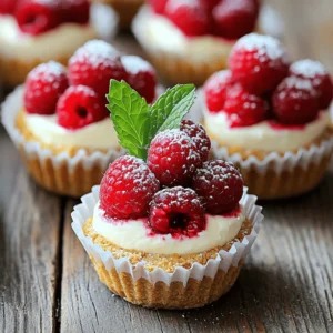 - Fresh raspberries - Cream cheese - Powdered sugar The main ingredients for Raspberry Cream Cheese Bites are fresh raspberries, cream cheese, and powdered sugar. Fresh raspberries add a burst of flavor and color. Cream cheese gives a rich, creamy texture. Powdered sugar sweetens the filling and helps it stay smooth. Together, they create a tasty filling that is hard to resist. - Graham cracker crumbs - Melted butter The crust is made from graham cracker crumbs and melted butter. Graham crackers provide a sweet and crunchy base. Mixing them with melted butter creates a sticky texture that holds together well. This crust balances the creaminess of the filling and adds a nice crunch with every bite. - Mint leaves for garnish - Vanilla extract You can add some optional ingredients for extra flair. Mint leaves make a great garnish, adding freshness and color. A splash of vanilla extract enhances the flavor of the cream cheese. These simple touches elevate your bites and make them even more delightful. For the full recipe, see above. First, preheat your oven to 350°F (175°C). This helps the bites bake evenly. While the oven heats up, grab a mixing bowl. Combine 8 oz of softened cream cheese, 1/4 cup of powdered sugar, and 1 teaspoon of vanilla extract. Mix everything until it is smooth and creamy. This filling will be rich and tasty. Next, take 1/2 cup of graham cracker crumbs. Mix it with 2 tablespoons of melted butter until it is well blended. This mixture will form the crust. Now, line a mini muffin pan with mini cupcake liners. Press the graham cracker mixture into the bottom of each liner, making a solid base for your bites. Now it's time to fill the liners. Spoon the cream cheese mixture over the crust in each liner. Fill them about two-thirds full. Next, take 1 cup of fresh raspberries and place one on top of each filled bite. Bake these in the preheated oven for about 15-18 minutes. You want the edges to be slightly golden and the filling to be set. Once done, remove them from the oven and let them cool at room temperature. Refrigerate for at least 30 minutes before serving. These steps ensure a delicious treat. For the full recipe, check out the detailed instructions. To make the cream cheese mixture smooth, start with softened cream cheese. If it is cold, it will be hard to mix. Leave it out for about 30 minutes before you use it. This helps create a nice, creamy texture. Mix the cream cheese with powdered sugar and vanilla extract until no lumps remain. A smooth filling makes each bite a delight. Keep a close eye on the baking time. Bake the bites for about 15-18 minutes. They should look slightly golden around the edges. If you bake them too long, they can dry out. After baking, let them cool at room temperature. This helps the filling set properly. For the best results, chill them in the fridge for at least 30 minutes before serving. They will taste even better when cold. These bites pair well with many drinks. A nice cup of tea or coffee complements the flavors. For a fun twist, serve them with a scoop of vanilla ice cream. You can also arrange them on a platter with fresh mint leaves for a pop of color. This makes them look fancy for guests. Enjoy exploring different ways to serve these tasty treats! {{image_2}} You can change the flavor of your Raspberry Cream Cheese Bites easily. Try different fruit toppings like blueberries or strawberries for a fun twist. Each fruit brings a unique taste and color. You can even use flavored cream cheese, like strawberry or vanilla. This small change adds a burst of flavor and keeps things exciting. If you want a gluten-free version, there are great options. You can use almond flour or oats instead of graham crackers for the crust. Just grind them into fine crumbs and mix with a bit of melted butter. This will create a tasty base that is still crunchy. Make sure to check that all ingredients are gluten-free to keep your bites safe. For a vegan option, you can use dairy-free cream cheese. Brands like Tofutti or Kite Hill offer tasty choices. Instead of powdered sugar, try using plant-based sweeteners like agave syrup or maple syrup. These swaps make the bites vegan and just as delicious. You can enjoy a creamy, sweet treat that fits your diet! For the complete recipe, check out the [Full Recipe]. To keep Raspberry Cream Cheese Bites fresh, store them in the fridge. Use an airtight container to prevent moisture loss. They last about three to four days in the fridge. Always check for any off smells or changes in texture before eating. If you want to keep them longer, freezing is a great option. Place the bites in a single layer on a baking sheet. Freeze them for about two hours. Once frozen, transfer them to a freezer-safe bag. They can stay good for up to two months. For best results, thaw them in the fridge overnight before serving. To reheat leftovers, the oven works best. Preheat the oven to 350°F (175°C). Place the bites on a baking sheet and heat for about 10 minutes. This method keeps the crust crispy. Avoid the microwave, as it can make them soggy. For great texture, let them cool for a few minutes before enjoying again. The prep time for these bites is about 15 minutes. The cook time takes 15 to 18 minutes. In total, you will spend about 1 hour from start to finish. This includes cooling time before serving. Yes, you can make these bites ahead. Prepare them and bake as directed. Let them cool completely. Once cooled, store them in the fridge. They will taste great for up to three days. You will know they are done when the edges are slightly golden. The filling should look set, not jiggly. A nice golden hue means they are ready to cool. This gives you the perfect texture for serving. In this post, I covered how to make delightful Raspberry Cream Cheese Bites. We went through the key ingredients, including fresh raspberries and graham cracker crust. I shared easy steps for preparation, baking tips, and creative variations to try. Remember, these bites can be stored well and enjoyed anytime. Don’t hesitate to experiment with flavors or toppings. With just a few ingredients, you can create a tasty treat that pleases everyone. Enjoy your baking!