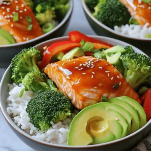To create the perfect Honey Sriracha Salmon Bowls, you need a few key ingredients. Here’s what you will need: - 2 salmon fillets - 2 tablespoons honey - 2 tablespoons Sriracha sauce - 1 tablespoon soy sauce - 1 teaspoon sesame oil - 1 cup jasmine rice - 2 cups water - 1 cup broccoli florets - 1 red bell pepper, thinly sliced - 1 avocado, sliced - 2 green onions, chopped - Sesame seeds for garnish - Salt and pepper to taste These ingredients come together to make a meal that is both tasty and easy to prepare. The salmon brings protein and healthy fats, while the honey and Sriracha mix adds a sweet and spicy kick. Jasmine rice serves as a soft base for the bowls. The fresh vegetables, like broccoli and red bell pepper, provide crunch and color. Finally, avocado and green onions add freshness and flair. For a complete guide, check the Full Recipe. First, make the honey Sriracha glaze. In a small bowl, whisk together 2 tablespoons of honey, 2 tablespoons of Sriracha sauce, 1 tablespoon of soy sauce, and 1 teaspoon of sesame oil. Add salt and pepper to taste. This mix adds a sweet and spicy kick. Next, preheat the oven to 375°F (190°C). The heat helps the salmon cook evenly. Now, brush the salmon fillets with the glaze. Place them on a lined baking sheet. Make sure to cover them well. This will create a tasty crust. Start by rinsing the jasmine rice. Place it in a sieve and run cold water over it. This removes excess starch. Rinse until the water runs clear. In a medium saucepan, combine 1 cup of rinsed rice with 2 cups of water. Bring it to a boil. Once it boils, reduce the heat to low. Cover the pot and let it cook for 15 minutes. Fluff the rice with a fork when done. For the broccoli florets, use a steamer basket over simmering water. Steam for about 4-5 minutes until they are tender-crisp. You can also use the microwave. Place the broccoli in a microwave-safe dish. Cover it with a damp paper towel and microwave for 2 minutes. If you want to mix it up, use other veggies like snap peas or carrots. Now, let’s put it all together! Start with a scoop of jasmine rice at the bottom of each bowl. On top of the rice, place a salmon fillet. Next, add the steamed broccoli, sliced red bell pepper, and avocado. Drizzle any leftover honey Sriracha sauce over everything. Finally, sprinkle with chopped green onions and sesame seeds for a nice touch. Enjoy your colorful and tasty Honey Sriracha Salmon Bowls! For the complete recipe, check out the Full Recipe. To ensure perfectly cooked salmon, start with fresh fillets. Look for a bright color and no fishy smell. Preheat your oven to 375°F. This is just right for baking. Brush the honey Sriracha glaze on the salmon. Bake for 12-15 minutes. The salmon should easily flake with a fork when done. If you prefer crispy skin, broil it for the last 2 minutes. For fluffy jasmine rice, rinse it under cold water. This removes excess starch and prevents clumping. Use a ratio of 1 cup rice to 2 cups water. Bring it to a boil, then lower the heat. Cover and let it simmer for 15 minutes. After cooking, fluff the rice with a fork gently. This adds air and keeps it light. To arrange the bowls for visual appeal, start with the rice as a base. Place it in the center of the bowl. Next, add the salmon fillet on one side. Arrange the broccoli and sliced red bell pepper on the other side. This creates a colorful display. For garnishing, use sliced avocado and chopped green onions. Sprinkle sesame seeds on top for crunch. You can also add a drizzle of the remaining honey Sriracha sauce. This adds flavor and looks great. Serve the bowls in deep dishes to highlight the vibrant colors. {{image_2}} You can easily swap salmon for other proteins. Chicken works great with the same honey Sriracha sauce. Just grill or bake chicken breast until it’s cooked through. Tofu is a fantastic vegan option. Use firm tofu and marinate it in the sauce before cooking. Want to mix things up? Try adding teriyaki sauce for a sweet twist. You can also use garlic or ginger in your sauce for extra flavor. Adjust the spice by adding more Sriracha or even some chili flakes if you like heat. Pair your Honey Sriracha Salmon Bowls with fresh cucumber salad or roasted sweet potatoes. These sides add nutrition and color. For drinks, iced green tea or a light white wine matches well with the spicy-sweet flavors. To keep your Honey Sriracha Salmon Bowls fresh, store leftovers correctly. First, let the bowls cool down to room temperature. Then, place them in airtight containers. This helps lock in flavors and prevent spoilage. - Use glass containers for safe storage. They are durable and help maintain taste. - If you only have plastic, make sure it is BPA-free and airtight. - Avoid stacking too many layers in one container. This can lead to sogginess. When it’s time to reheat, you have a couple of options: the microwave or the oven. Each method works well, but they each have their pros and cons. - Microwave: This is quick and easy. Place your bowl in the microwave and cover it loosely. Heat in short bursts, stirring in between to ensure even heating. - Oven: This method takes longer but keeps the texture better. Preheat your oven to 350°F (175°C). Place the bowl on a baking sheet and cover it with foil. Bake for about 10-15 minutes, or until warmed through. To maintain texture, avoid overheating. This keeps your salmon flaky and your veggies crisp. You want to enjoy every bite just like when you first made it! The salmon takes about 12 to 15 minutes to bake. You should check if it flakes easily with a fork. This shows it's done. The cooking time may change based on the oven's heat and the thickness of the fillets. Yes, you can make the honey Sriracha sauce ahead of time. Mix the honey, Sriracha, soy sauce, and sesame oil in a bowl. Store it in the fridge for a few days. This makes meal prep easier and saves time. If you don't have Sriracha, you can use other hot sauces. Try chili garlic sauce or sambal oelek. These sauces will give you a nice heat and flavor. You can also mix chili powder with honey for a milder option. The recipe can be made gluten-free. Use gluten-free soy sauce in place of regular soy sauce. All other ingredients are naturally gluten-free. This way, everyone can enjoy this tasty meal. For the Full Recipe, please refer to the earlier sections. This blog post covered how to make a tasty salmon bowl. You learned what ingredients to use, like salmon, honey, and veggies. I shared step-by-step instructions, from prepping the salmon to steaming broccoli. You got cooking and presentation tips for the best results. We also discussed variations, like using chicken or tofu, and how to store leftovers. Now, you can make a healthy and fun salmon bowl at home. Each bite is sure to impress! Enjoy creating and sharing this delicious meal.