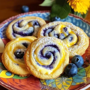 - 1 cup unsalted butter, softened - 1 cup granulated sugar - 1 cup brown sugar, packed - 2 large eggs - 1 tablespoon vanilla extract - 3 cups all-purpose flour - 1 teaspoon baking soda - 1/2 teaspoon salt - 1 cup cream cheese, softened - 1/4 cup powdered sugar - 1 cup fresh blueberries (or frozen, thawed) - Zest of 1 lemon The main ingredients create the base of the cookies. The butter gives them a rich taste. The sugars add sweetness and help the cookies rise. The eggs bind everything together. Flour is the backbone of the dough, while baking soda helps it rise. The cream cheese brings that cheesecake flavor. Adding powdered sugar makes the cheesecake mix sweet. Fresh blueberries burst with flavor and color. Lemon zest adds a bright note to the cookies. - Mixing bowls - Electric mixer - Measuring cups and spoons - Baking sheets - Parchment paper Having the right tools makes cooking easier. Mixing bowls help combine ingredients. An electric mixer speeds up creaming butter and sugar. Measuring cups and spoons ensure accuracy. Baking sheets provide a flat surface, and parchment paper helps with easy removal. Using these tools allows for a smooth baking experience. You’ll find that preparing these cookies becomes more fun and less messy! If you want more detailed steps, check out the Full Recipe. - Preheat your oven to 350°F (175°C). - In a large bowl, cream the butter, granulated sugar, and brown sugar together until fluffy. This takes about 3-4 minutes. - Add the eggs one at a time, mixing well. Stir in the vanilla extract. - In another bowl, beat the cream cheese and powdered sugar until smooth. - Fold in the lemon zest for a fresh taste. - Gently fold the blueberries into the cookie dough. Be careful not to crush them. - Take a scoop of cookie dough and flatten it in your palm. - Place about a teaspoon of the cheesecake mixture in the center. Fold the dough around it to form a ball. - Repeat this until all dough is used, placing the balls on the baking sheet with space between them. - Use a toothpick to swirl the tops of each cookie. This adds a fun look without mixing fully. - Place the cookie dough balls on a baking sheet. - Bake them in the preheated oven for 12-15 minutes. The edges should be lightly golden. - Allow the cookies to cool on the baking sheet for about 5 minutes. Then, transfer them to a wire rack to cool completely. For more details, check the Full Recipe. To make your cookies light and fluffy, use room temperature ingredients. This helps everything mix well. Cold butter or eggs can lead to dense cookies. Also, don't overmix the dough. Overmixing can make your cookies tough. Just mix until you see no dry flour. To make your cookies even better, experiment with different citrus zests. Lemon, lime, or orange can add a fresh taste. You can also try adding vanilla bean or almond extract. These will give your cookies a unique twist. When serving, dust the cookies with powdered sugar. This gives a nice, sweet look. You can also serve them with fresh blueberries or whipped cream. This adds color and flavor. For a fun touch, try placing them on a colorful plate. {{image_2}} You can have fun with flavor twists. Here are two ideas: - Lemon Blueberry Cheesecake Swirl Cookies: Add a bright zing by mixing in more lemon zest. This will enhance the fresh blueberry taste. You’ll love the sweet and tart balance. - Chocolate Chip Blueberry Cheesecake Cookies: Mix in chocolate chips with the blueberries. This adds a rich, creamy touch. The chocolate pairs well with the cheesecake flavor. To make these cookies gluten-free, swap all-purpose flour for a gluten-free flour blend. This simple change keeps the cookies delicious and soft. Make sure the blend you choose works well for baking. If you want a dairy-free treat, pick a dairy-free cream cheese alternative. Many brands offer tasty options now. This way, you can enjoy the same creamy texture without dairy. - Store in an airtight container at room temperature. - Refrigerate if you prefer a firmer texture. Keeping your Blueberry Cheesecake Swirl Cookies fresh is simple! I recommend using an airtight container. This helps keep the cookies soft and tasty for longer. If you like a chewier bite, place them in the fridge. The cold will firm them up a bit. Just remember to take them out a few minutes before you eat them. - Freeze unbaked cookie dough balls. - Thaw before baking. If you want to save some for later, freezing the dough is a great option. Scoop the unbaked cookie dough balls onto a baking sheet. Make sure they don’t touch each other. Freeze them for a few hours until solid, then transfer them to a freezer bag. When you’re ready to bake, just thaw them for about 30 minutes. Then, bake as usual. This way, you have fresh cookies whenever you want! Yes, make sure to thaw and drain excess moisture. Frozen blueberries work well in this recipe. They add a nice burst of flavor, just like fresh ones. Cookies can last up to one week when properly stored. Keep them in an airtight container to maintain freshness. You can enjoy these cookies for days! Chill the dough for a short period to make it easier to handle. This helps firm up the butter and makes shaping the cookies a breeze. Yes, you can prepare the dough a day in advance and refrigerate. This saves time and allows flavors to meld. Just scoop and bake when ready! Refer to the 'Blueberry Cheesecake Swirl Cookies' section for the full recipe. This will guide you through each step to make these tasty treats. In this article, we explored how to make Blueberry Cheesecake Swirl Cookies. We covered the key ingredients, tools, and step-by-step instructions to help you bake these tasty treats. Don’t forget the tips to enhance flavor and achieve the best texture. You can also try fun variations, like lemon or gluten-free options. With easy storage tips, these cookies stay fresh longer. Enjoy your baking adventure and share these delightful cookies with others!