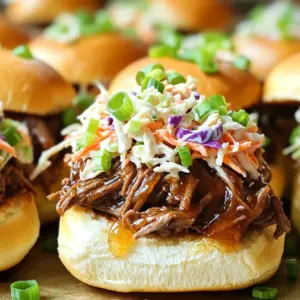 - 2 lbs beef chuck roast - 1/2 cup honey - 1/4 cup soy sauce (or tamari) - 4 cloves garlic - 1 tablespoon fresh ginger - 1 teaspoon black pepper - 1/2 teaspoon crushed red pepper flakes - 1 cup beef broth - 12 slider buns - 1 cup coleslaw mix - 1/4 cup sliced green onions For this recipe, I focus on simple yet bold flavors. The beef chuck roast is perfect because it becomes tender and juicy after slow cooking. Honey adds a sweet touch, while soy sauce brings the umami. I love using garlic and ginger to give the dish depth. Black pepper adds warmth, and crushed red pepper flakes can bring some heat if you like. Beef broth keeps everything moist and flavorful. The slider buns are essential. They hold all that goodness well. Coleslaw mix adds crunch and freshness, making each bite delightful. Finally, green onions give a pop of color and bright flavor. Gather these ingredients, and you are ready to create a tasty treat everyone will enjoy. First, let's season the beef. Take your beef chuck roast and cut it into large chunks. Sprinkle black pepper over the beef. If you like some heat, add crushed red pepper flakes too. This will give your sliders a nice kick. Next, prepare your slow cooker. Make sure it is clean and ready. You want to set it on a flat surface. This helps the heat spread evenly while cooking. Now, let's make the sauce. In a bowl, combine honey, soy sauce, minced garlic, and grated ginger. Add one cup of beef broth for extra flavor. Whisk everything together until it blends well. This sweet and savory sauce will soak into the beef and make it tasty. Time to slow cook! Place the seasoned beef chunks into the slow cooker. Pour the honey garlic sauce over the beef. Make sure every piece is coated well. Cover the slow cooker and set it on low. Cook for 6 to 8 hours. The beef should become fork-tender. When it's done, remove the beef from the slow cooker. Use two forks to shred it into bite-sized pieces. Return the shredded beef to the slow cooker. Stir it well with the sauce to mix all the flavors. Your slider filling is ready! - Serve these sliders with crispy sweet potato fries or a fresh garden salad. - Pair with a light beverage like iced tea or lemonade for balance. - Serve warm for the best taste and texture. Aim for a temperature around 160°F for the beef. - To ensure the beef is tender, cook it on low for 6-8 hours. This slow method breaks down the meat's fibers. - You can use chicken or pork if you want a different protein. Adjust cooking times slightly for these meats. - Toast the slider buns for extra flavor. This adds a nice crunch and warmth. - Keep toppings like coleslaw and green onions in separate bowls. This keeps them fresh and crisp until serving. {{image_2}} You can switch up the meat for these sliders. Use chicken or pork instead of beef. Chicken breast works great, too. Just keep the cooking time the same. If you use pork shoulder, the sliders will have a lovely flavor. Both options stay tender when cooked in the slow cooker. You can still use the same honey garlic sauce with these proteins. Want some heat? Add more spice with peppers! You can use jalapeños or diced serrano peppers. Just mix them in with the beef. If you like it extra spicy, add crushed red pepper flakes. Start with a small amount. You can always add more if needed. This can make your sliders exciting and flavorful. For a healthier twist, try whole grain buns. These buns add fiber and nutrients. You can also use a low-sugar sauce. This will help reduce sugar in your meal. Look for sauces with less than 5 grams of sugar. You can still get that sweet flavor without the extra calories. This way, you enjoy your sliders and feel good about what you eat. To store leftovers, let the sliders cool down first. Place them in an airtight container. You can keep them in the fridge for up to three days. If you only have the meat left, store it separately for better flavor. Always make sure to seal the container tight. This will help keep the beef juicy and tasty. For freezing sliders, it’s best to freeze the beef and buns separately. Let the beef cool before packing it in freezer bags. Remove as much air as possible. You can freeze the beef for up to three months. Buns can also be frozen, but they don't hold up as well. If you freeze them, wrap them in plastic wrap. This will help prevent freezer burn. When reheating, use the oven or a stovetop for best results. For the oven, preheat it to 350°F. Place the beef in a baking dish and cover with foil. Heat for about 15-20 minutes. On the stovetop, add the beef to a pan with a little water. Heat over low until warm. Avoid the microwave if you can. It can dry out the beef and make the buns soggy. These sliders take about 6 to 8 hours to cook on low. The beef should become very tender during this time. You want it to shred easily with a fork. If you set it on high, it may cook in about 4 to 5 hours, but low is best for flavor. Yes, you can make the sauce ahead. Mix the honey, soy sauce, garlic, ginger, and beef broth in a bowl. Store it in the fridge in an airtight container. This will keep for about 3 days. It helps to save time when you are ready to cook. If you don’t have beef broth, you can use chicken broth or vegetable broth. Both options will still give a nice flavor. You can even use water and add a little soy sauce for taste. In this post, we explored a delicious slow cooker beef slider recipe. We covered the main and additional ingredients, step-by-step cooking instructions, and tips for the best results. You can serve these sliders with various sides and even modify the recipe for different tastes. Remember to store leftovers properly for the best flavor later. Enjoy your cooking and share these tasty sliders with friends! Your next meal just got a whole lot better.