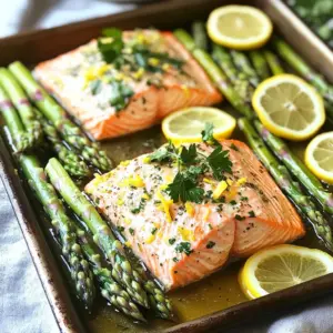 - 4 salmon fillets (about 6 ounces each) - 1 bunch of asparagus, trimmed - 2 tablespoons olive oil - Juice and zest of 1 lemon - 2 cloves garlic, minced - 1 teaspoon dried dill - 1 teaspoon dried thyme - Salt and pepper to taste - Lemon slices for garnish - Fresh parsley for garnish Gather these fresh ingredients to create your meal. Start with salmon fillets, which are rich in omega-3 fatty acids. Choose vibrant asparagus for color and crunch. The olive oil adds healthy fat and flavor. Now, let's talk about the flavor additions. The lemon juice and zest bring brightness. Garlic adds depth to the dish. Dried dill and thyme give it an herbaceous touch. These simple flavors combine beautifully. When seasoning, use salt and pepper to enhance taste. The lemon slices will add a nice touch when serving. Fresh parsley brightens up the dish too. With these ingredients, you set the stage for a delightful and flavorful meal. Enjoy the process of cooking and the delicious results! Start by preheating your oven to 400°F (200°C). This step ensures the salmon cooks evenly. Next, grab a large sheet pan and line it with parchment paper. This makes cleaning up a breeze! In a small bowl, whisk together the olive oil, lemon juice, and lemon zest. Add the minced garlic, dried dill, and dried thyme to the mix. Don’t forget to season with salt and pepper to taste. This mixture will give your salmon and asparagus a bright, fresh flavor. Now, place the salmon fillets in the center of your prepared sheet pan. Make sure they have some space around them. Next, arrange the trimmed asparagus around the salmon. This not only looks nice but also allows everything to cook evenly. Drizzle the lemon herb mixture over both the salmon and asparagus. Ensure everything gets a nice coat of that tasty mix. It’s time to bake! Put the sheet pan in the oven and let it bake for 12 to 15 minutes. Keep an eye on it. The salmon should be cooked through and flake easily with a fork. The asparagus should be tender yet still crisp. Once done, remove the sheet pan from the oven. Let it rest for a few minutes before serving. To check if your salmon is done, use a fork. Gently press the thickest part. If it flakes easily, it’s ready. Salmon should reach an internal temp of 145°F (63°C). Use a meat thermometer for accuracy if you want. For asparagus, keep it crisp by not overcooking. Bake it for about 12-15 minutes. Look for a bright green color, and it should still have some snap when you bite it. To impress at a dinner party, serve the dish straight from the sheet pan. This gives a fun and rustic vibe. You can also plate individual servings. Just add a lemon slice and a sprinkle of parsley on top. This adds color and makes it look fancy. Pair this dish with light sides. A fresh salad or some fluffy rice works well. For drinks, try a white wine or sparkling water with lemon. Both will refresh your palate. Cleanup is easy with parchment paper. It prevents food from sticking and makes washing up a breeze. Just lift the paper and toss it in the trash. Other helpful tools include a silicone spatula for scraping and a good knife for cutting. These will make your cooking and cleanup smoother. Use a cutting board that’s easy to clean, too. {{image_2}} You can mix things up with different veggies. Try bell peppers, green beans, or zucchini. These choices add color and crunch. Each veggie brings its own flavor and texture. For herbs, you have options. Basil and oregano can change the taste of the dish. Fresh herbs offer a bright kick. You can also use cilantro for a unique twist. You can grill or bake the salmon. Grilling gives it a nice char and smoky taste. Baking is simple and easy, with less mess. If your salmon fillets are thick, adjust the cooking time. You might need 16-20 minutes instead of 12-15. Always check to make sure they flake easily with a fork. Want a bit of heat? Add some red pepper flakes or paprika. These spices can wake up the dish. You can also swap lemons for other citrus fruits. Try limes or oranges for a sweet touch. Each fruit will change the flavor in a fun way. To keep your salmon and asparagus fresh, let them cool first. Place them in an airtight container. This helps prevent any odors from mixing in your fridge. Leftovers can last for up to three days in the fridge. Always check for any off smells or changes in texture before eating. You can freeze salmon and asparagus for later meals. Cut the salmon into portions before freezing. Wrap each piece tightly in plastic wrap, then store in a freezer bag. This keeps them fresh for up to three months. To reheat, thaw overnight in the fridge. Then, bake at 350°F (175°C) until warmed through, about 10-15 minutes. Leftovers can make quick and easy meals. Chop the salmon and asparagus into bite-sized pieces. Mix them into salads or grain bowls for a tasty lunch. For meal prep, you can cook extra salmon and asparagus on your busy days. Store them in individual containers for a fast and healthy dinner later. Bake salmon in a sheet pan for 12-15 minutes at 400°F (200°C). This time ensures the salmon cooks perfectly. The fish should flake easily with a fork when done. Make sure to check its doneness by looking for a light pink color in the center. If you have thicker fillets, you may need a couple of extra minutes. Yes, you can use frozen salmon. Just be sure to thaw it in the fridge overnight. If you are in a hurry, thaw it in cold water for about an hour. If using frozen salmon, add an extra 2-3 minutes to the baking time. Check for doneness by using the same method as fresh salmon. Many sides pair well with this dish. Here are a few great options: - Simple salads: A fresh green salad with lemon vinaigrette works well. - Grains: Quinoa or brown rice adds a lovely touch. - Roasted potatoes: Crispy potatoes can balance the meal nicely. These sides enhance the flavors and complete your dinner. Enjoy! This recipe gives you a simple way to cook salmon and asparagus. You learned about the main ingredients, cooking steps, and tips to make your dish shine. Remember to check for doneness and keep your asparagus crisp. Don't hesitate to experiment with flavors or swap ingredients to suit your taste. With the right prep, you can enjoy these leftovers in new meals. Try this easy recipe tonight and impress your family or friends. Happy cooking!