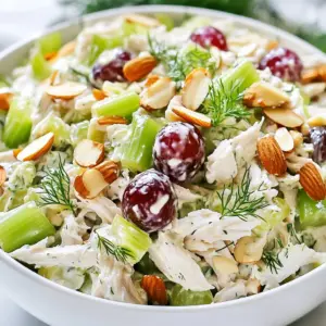 - 2 cups cooked chicken breast, shredded - 1 cup plain Greek yogurt - 1/2 cup celery, finely chopped - 1/2 cup red grapes, halved - 1/4 cup almonds, slivered or chopped - 1/4 cup green onion, sliced - 2 tablespoons Dijon mustard - 1 tablespoon honey - 1 tablespoon lemon juice - Salt and pepper to taste - Fresh dill or parsley for garnish This Greek yogurt chicken salad is not only tasty but also healthy. Each serving has about: - Calories: 330 - Protein: 30g - Fat: 15g - Carbohydrates: 20g - Fiber: 2g Greek yogurt adds protein and keeps the salad creamy. The chicken gives you more protein, while the grapes and almonds add some crunch. You can change some ingredients to fit your taste. Here are a few ideas: - Use rotisserie chicken instead of cooked chicken breast for a quick option. - Swap red grapes with chopped apples for a different sweet flavor. - Instead of almonds, try walnuts or pecans for a nutty twist. - Use low-fat yogurt for fewer calories. - For a dairy-free option, use a plant-based yogurt. These swaps keep the salad fresh and exciting! {{ingredient_image_1}} Start with 2 cups of cooked chicken breast. I like to use shredded chicken for a nice texture. You can use leftover chicken or even rotisserie chicken if you are in a hurry. Place the shredded chicken in a large mixing bowl. In a separate bowl, mix 1 cup of plain Greek yogurt with 2 tablespoons of Dijon mustard. Add 1 tablespoon of honey and 1 tablespoon of lemon juice for sweetness and a bit of tang. Season with salt and pepper to taste. Stir until everything blends well. Now, take the chicken bowl. Add in 1/2 cup of finely chopped celery, 1/2 cup of halved red grapes, and 1/4 cup of slivered almonds. These ingredients give the salad crunch and sweetness. Pour the yogurt dressing over the chicken mixture. Gently fold everything together. Make sure all the ingredients get coated. Taste it, and adjust the seasoning if needed. You can serve it right away or chill it for about 30 minutes. This allows the flavors to come together better. Enjoy your healthy Greek yogurt chicken salad! To make your Greek yogurt chicken salad shine, think about adding fresh herbs. I love using dill or parsley. They add a bright taste. You can also try adding a splash of vinegar. A bit of apple cider vinegar can give your dish a nice kick. For a hint of spice, add some black pepper or a dash of paprika. You could even toss in some chopped pickles for a tangy crunch. Meal prep makes life easier. You can prepare this salad ahead of time. Make it on Sunday for easy lunches all week. Just store it in an airtight container. Keep it in the fridge. It will stay fresh for about three to four days. If you want to keep the crunch of the nuts, add them just before serving. This way, they won&rsquo;t get soft. Serve your chicken salad in a chilled bowl. A cold bowl keeps the salad fresh and tasty. You can also pair it with whole-grain crackers for a great crunch. Another fun idea is to put it on a bed of lettuce. This adds color and texture. For a special touch, sprinkle extra herbs on top. This makes the dish look beautiful and appetizing! Pro Tips Chill for Flavor: Letting the chicken salad chill in the refrigerator for at least 30 minutes allows the flavors to meld beautifully, enhancing the overall taste. Custom Crunch: Feel free to substitute almonds with walnuts or pecans for a different texture and flavor in the salad. Fresh Herbs Boost: Adding fresh herbs such as dill or parsley not only garnishes the dish but also elevates the freshness and flavor profile. Perfect Pairing: Serve the chicken salad on a bed of mixed greens or with whole-grain crackers for a satisfying and nutritious meal. {{image_2}} You can switch up the protein in your Greek yogurt chicken salad. Try using turkey instead of chicken. It adds a nice flavor and is still healthy. You could also use canned tuna or even shrimp for a seafood twist. Each option will give you a different taste, yet keep it light and delicious. If you want a vegan or vegetarian version, there are great options. Use chickpeas or black beans instead of chicken. They add protein and texture. For the yogurt, you can use a plant-based yogurt. Look for brands made from almonds or coconut. This way, you enjoy the same creamy goodness without the dairy. Flavor is key in any dish. You can make your salad spicy by adding jalape&ntilde;os or a dash of hot sauce. If you prefer sweet, mix in some diced apples or dried cranberries. You can even toss in curry powder for an exotic twist. These flavors make the salad exciting and fun to eat! You can store leftover Greek yogurt chicken salad in an airtight container. This keeps the salad fresh. Make sure to seal it tightly. Place it in the fridge right away. This stops bacteria from growing. This chicken salad lasts about 3 to 4 days in the fridge. If you want to keep it longer, consider freezing it. However, freezing may change the texture. I recommend eating it fresh for the best taste. You do not need to heat this salad. It tastes great cold. If you prefer warm chicken salad, heat it gently in a pan. Do not microwave for long. This can make the yogurt runny and change how it tastes. Enjoy your salad fresh for the best flavor! Yes, you can use rotisserie chicken. It saves time and adds great flavor. Simply shred the chicken into bite-sized pieces. This method works well when you want a quick meal. Plus, it keeps the dish easy and tasty. Greek yogurt chicken salad lasts about 3 to 5 days in the fridge. Store it in an airtight container. This helps keep it fresh and safe to eat. Always check for any change in smell or texture before serving. You can serve the salad in many ways. Try it on whole-grain crackers for a crunchy snack. You can also serve it on a bed of lettuce for a light meal. Pair it with fresh fruit or a side of veggies for more nutrition. This salad is versatile and easy to enjoy! This blog post covered how to make a tasty Greek yogurt chicken salad. We explored key ingredients, their nutrition, and tasty substitutes. You learned step-by-step instructions for prepping chicken and making the dressing. We shared tips to boost flavors and ideas for meal prep. You also discovered variations, storage tips, and answers to common questions. Embrace this recipe for a healthy meal that is easy and flexible. Enjoy cooking and experimenting with flavors!